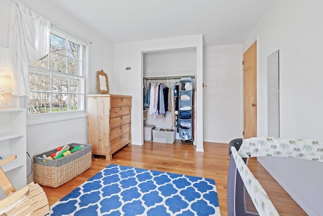 bedroom featuring light wood-type flooring