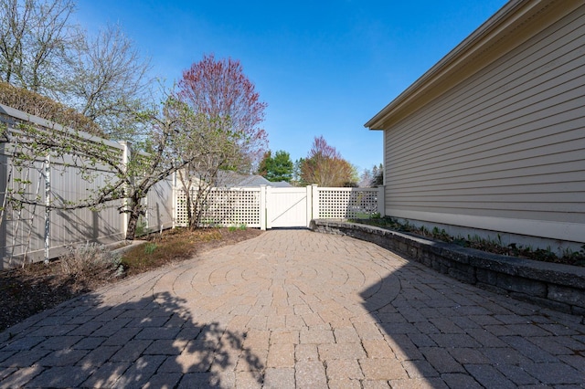 3 Augusta National # 145, Bedford, NH 03110 - view of patio / terrace with a gate and fence