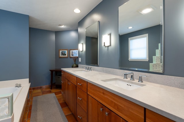 3 Augusta National # 145, Bedford, NH 03110 - full bathroom featuring a sink, a bath, recessed lighting, and double vanity