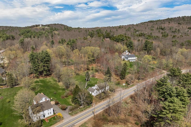 bird's eye view featuring a forest view