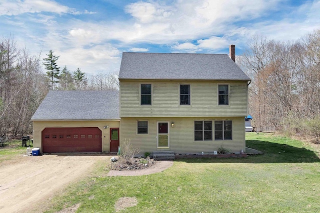 colonial home featuring a garage, dirt driveway, a chimney, and a front yard