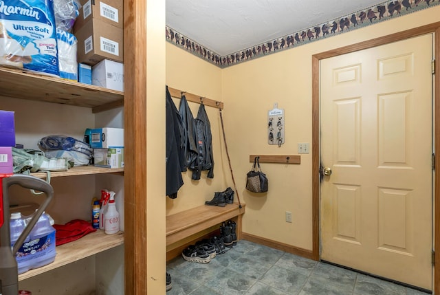 mudroom with baseboards and visible vents