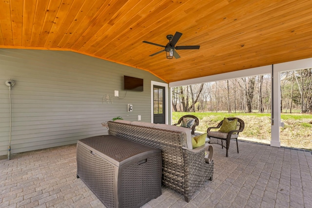 view of patio / terrace featuring ceiling fan