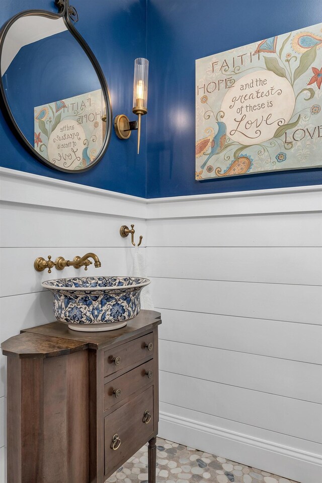 details with wainscoting and vanity