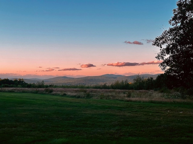 mountain view featuring a rural view