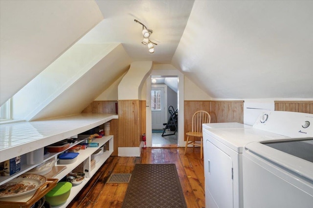 16 Manchester St Unit 2, Pittsfield, NH 03263 - washroom with laundry area, visible vents, wainscoting, dark wood-style floors, and washer and dryer