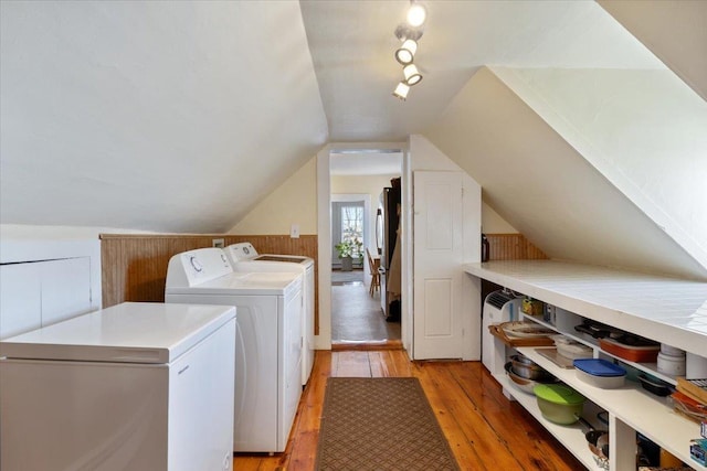 16 Manchester St Unit 2, Pittsfield, NH 03263 - laundry room featuring independent washer and dryer, laundry area, wood walls, and light wood-type flooring