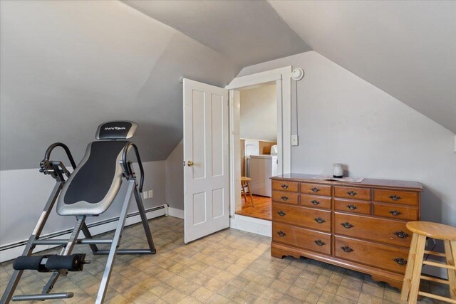 16 Manchester St Unit 2, Pittsfield, NH 03263 - workout area featuring washer / dryer, light floors, vaulted ceiling, and a baseboard radiator