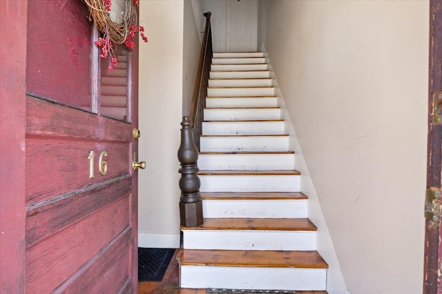 16 Manchester St Unit 2, Pittsfield, NH 03263 - staircase with baseboards