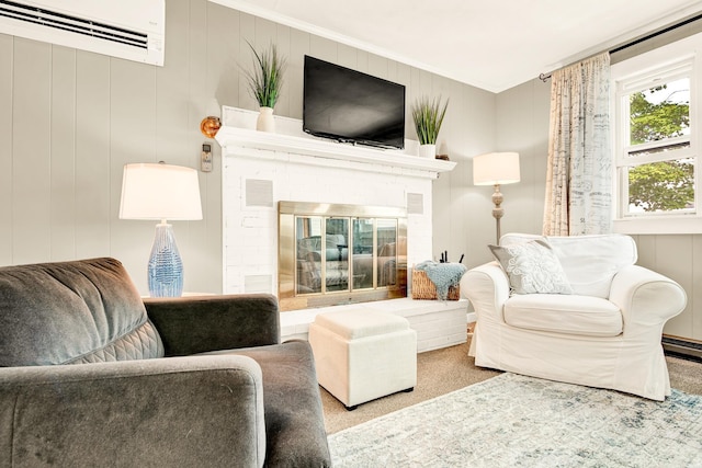 sitting room with a wall mounted air conditioner, carpet, a fireplace, and ornamental molding