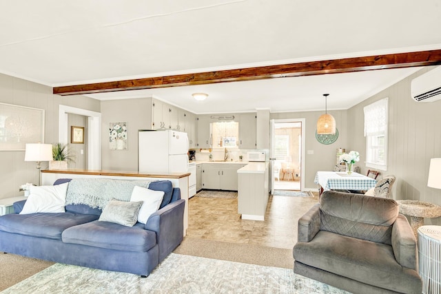 living area featuring crown molding, wooden walls, and a wall mounted air conditioner