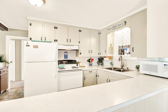 kitchen featuring ornamental molding, white appliances, light countertops, under cabinet range hood, and a sink