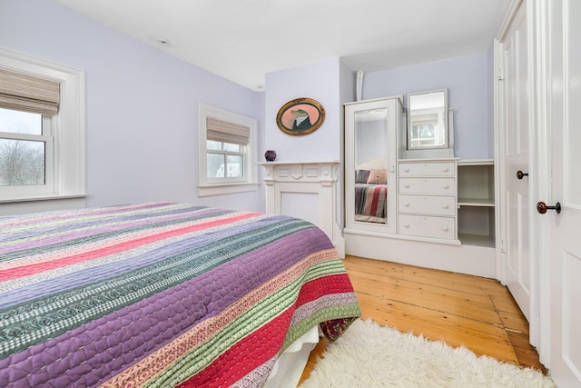 bedroom with wood finished floors