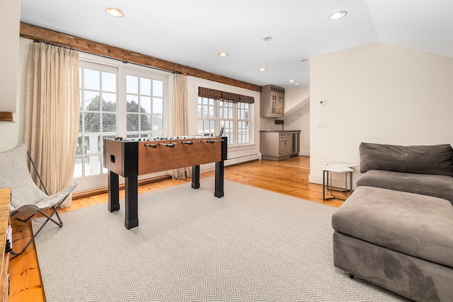 recreation room with light wood-type flooring and recessed lighting