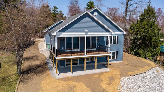 back of house with a patio area
