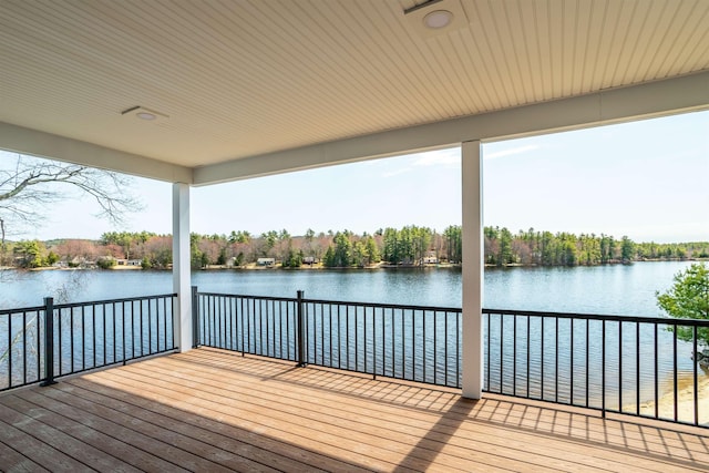 deck featuring a water view