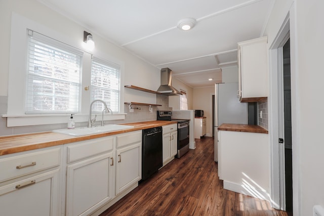 kitchen featuring electric range, wooden counters, wall chimney exhaust hood, a sink, and dishwasher