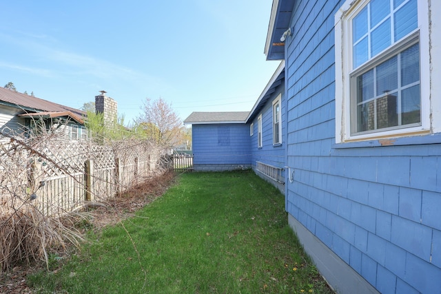 view of yard with fence