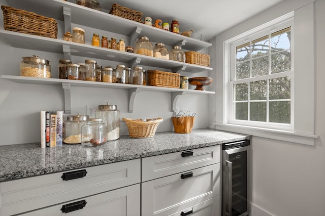 pantry featuring wine cooler