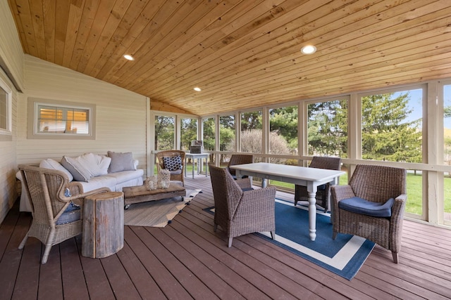 sunroom / solarium featuring an outdoor hangout area, plenty of natural light, and outdoor dining area