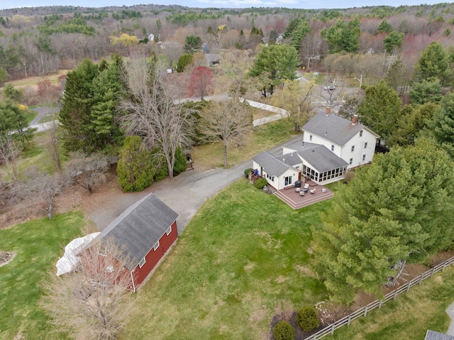 bird's eye view featuring a view of trees