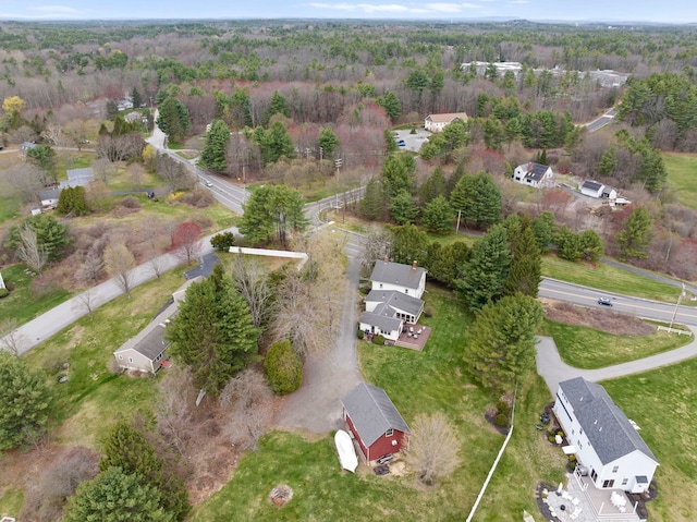 bird's eye view featuring a forest view