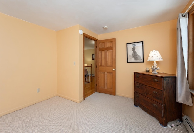 bedroom featuring baseboards, light colored carpet, and a baseboard radiator