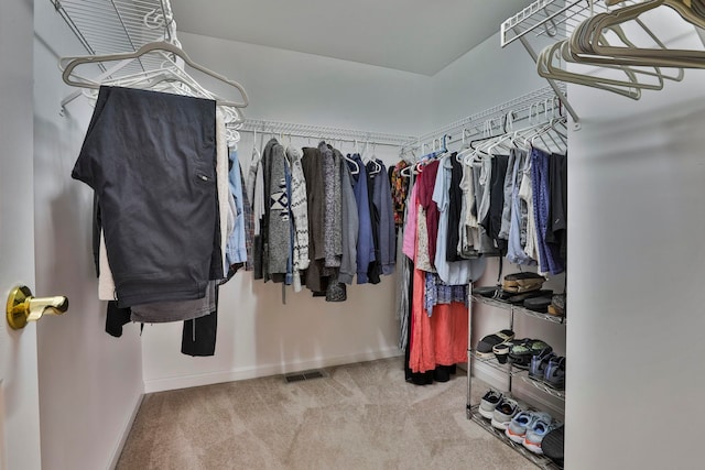 spacious closet with carpet and visible vents
