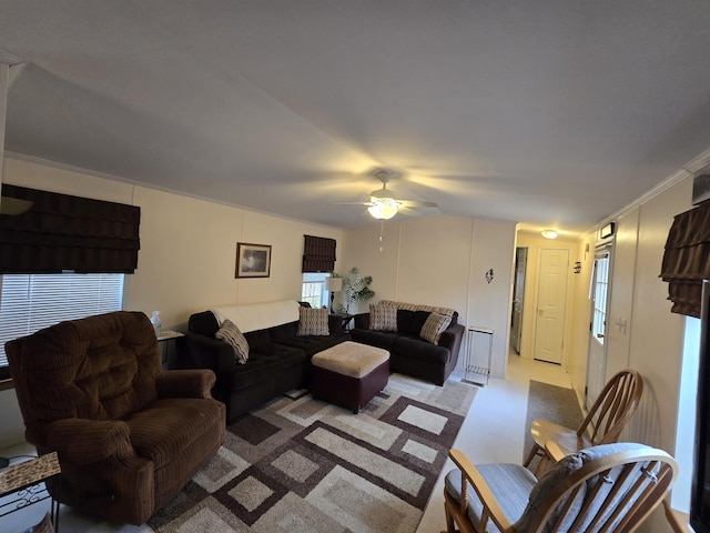 living area with ceiling fan