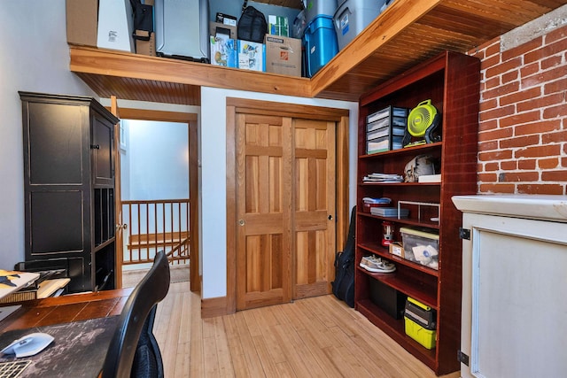 office space with light wood-style flooring