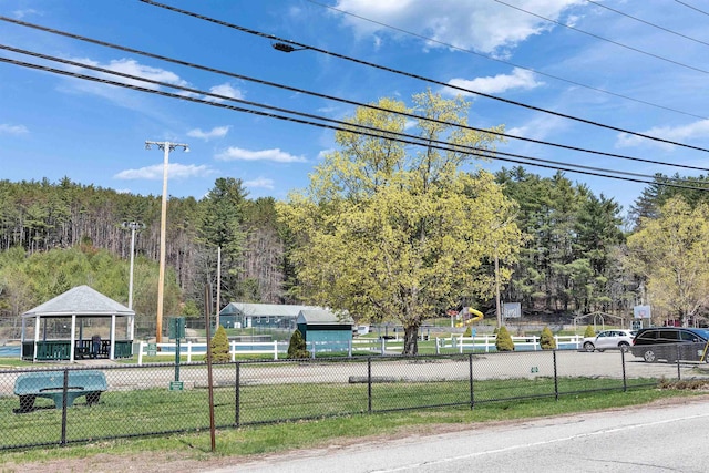 view of street with a forest view