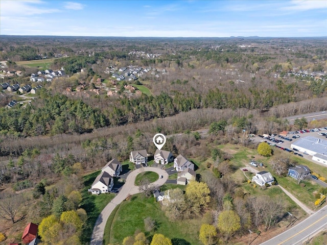aerial view with a wooded view