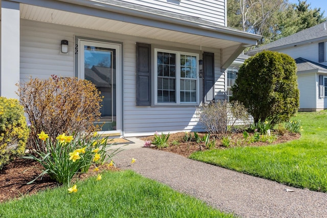 property entrance featuring covered porch