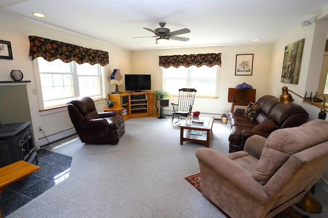 living room with a baseboard radiator, ceiling fan, recessed lighting, and baseboard heating