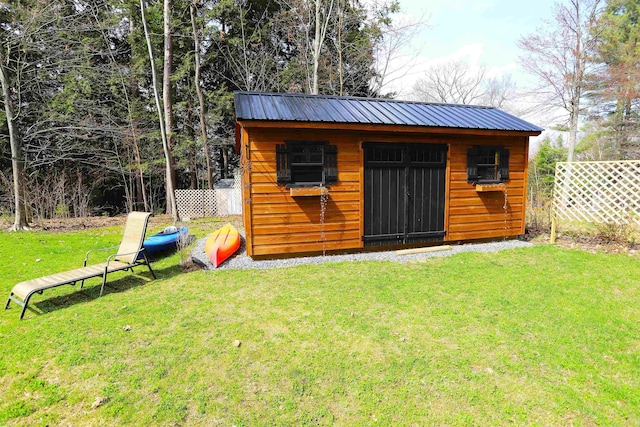 view of outdoor structure featuring an outbuilding