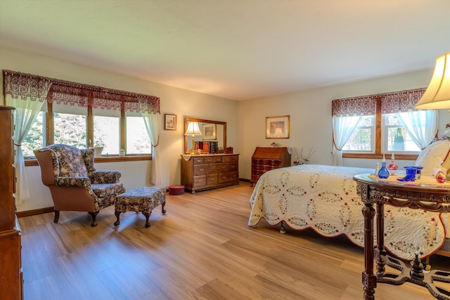 bedroom featuring light wood-style floors