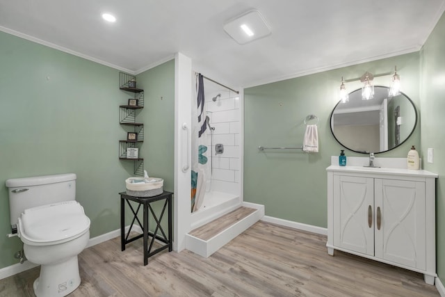 bathroom with toilet, baseboards, a shower stall, wood finished floors, and ornamental molding