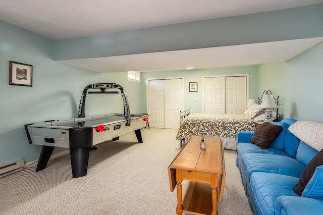 game room featuring carpet flooring and a baseboard radiator