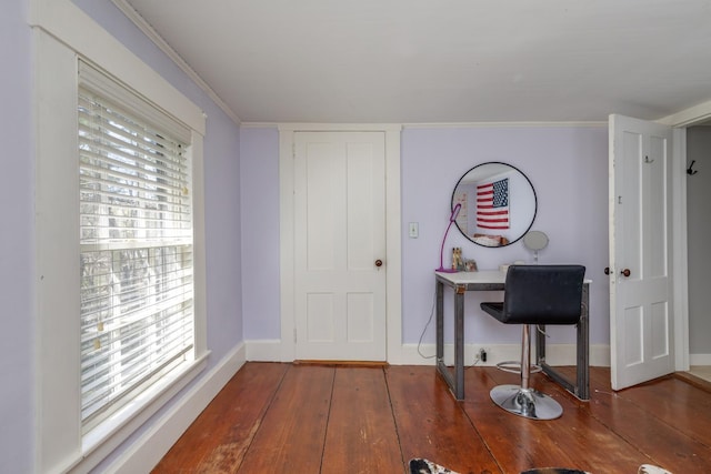 office featuring baseboards and wood-type flooring
