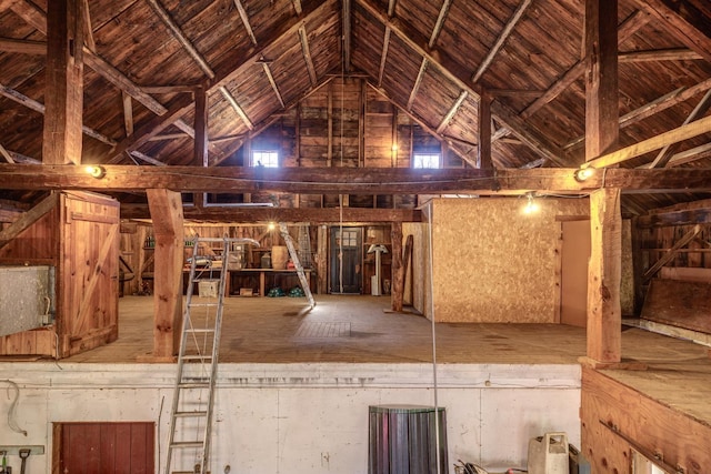 misc room featuring lofted ceiling