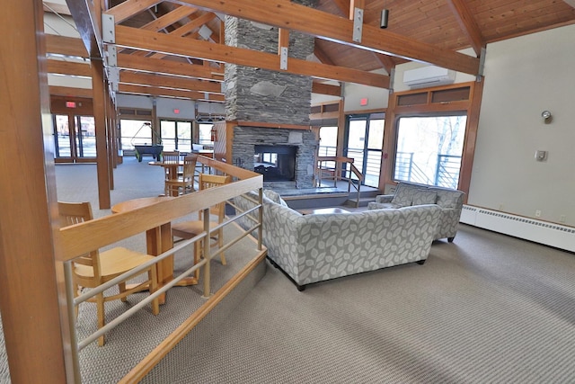 living area featuring a stone fireplace, carpet, a wall unit AC, a baseboard radiator, and beamed ceiling