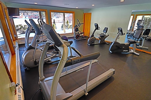 exercise room with recessed lighting