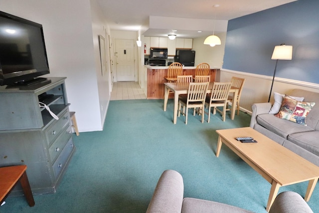 living area with carpet floors