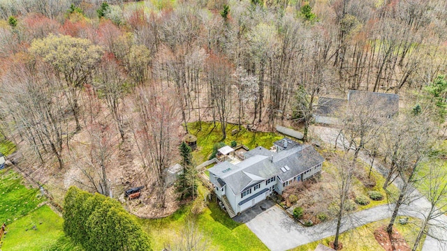 bird's eye view featuring a view of trees