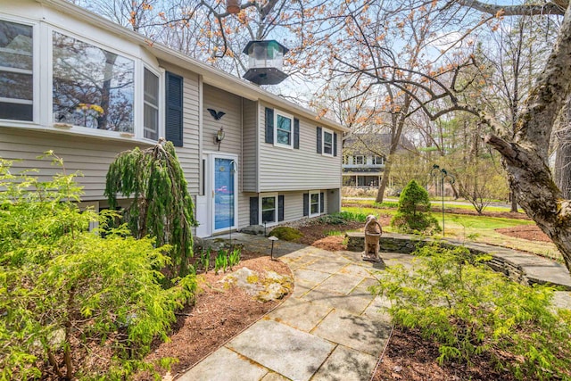 view of front of home with a patio