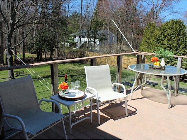view of wooden balcony featuring a wooden deck