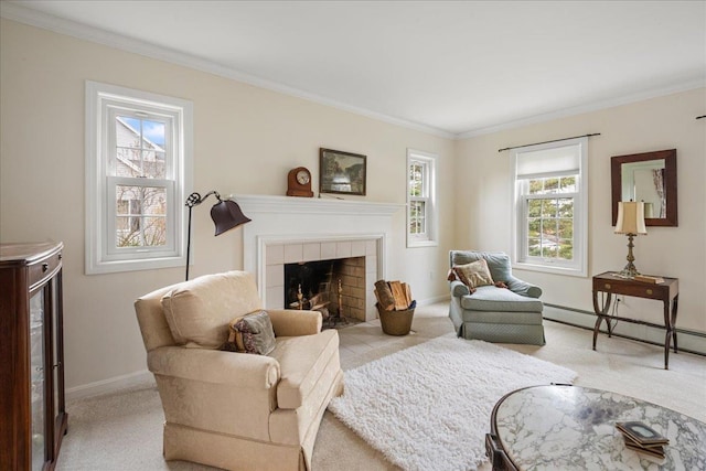 carpeted living area featuring crown molding, baseboards, baseboard heating, and a fireplace