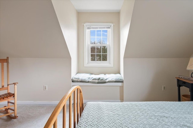 bedroom featuring baseboards and carpet