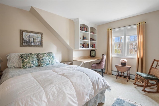 carpeted bedroom featuring a baseboard radiator