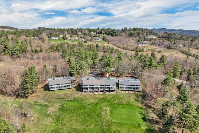 aerial view with a wooded view